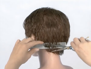 Cette image est extraite du cours en ligne « La coupe méthode globale ». Elle représente une technique de coupe peigne-ciseaux réalisée sur une tête d'apprentissage.